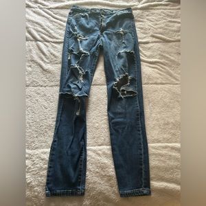 blue wash skinny jeans with rips